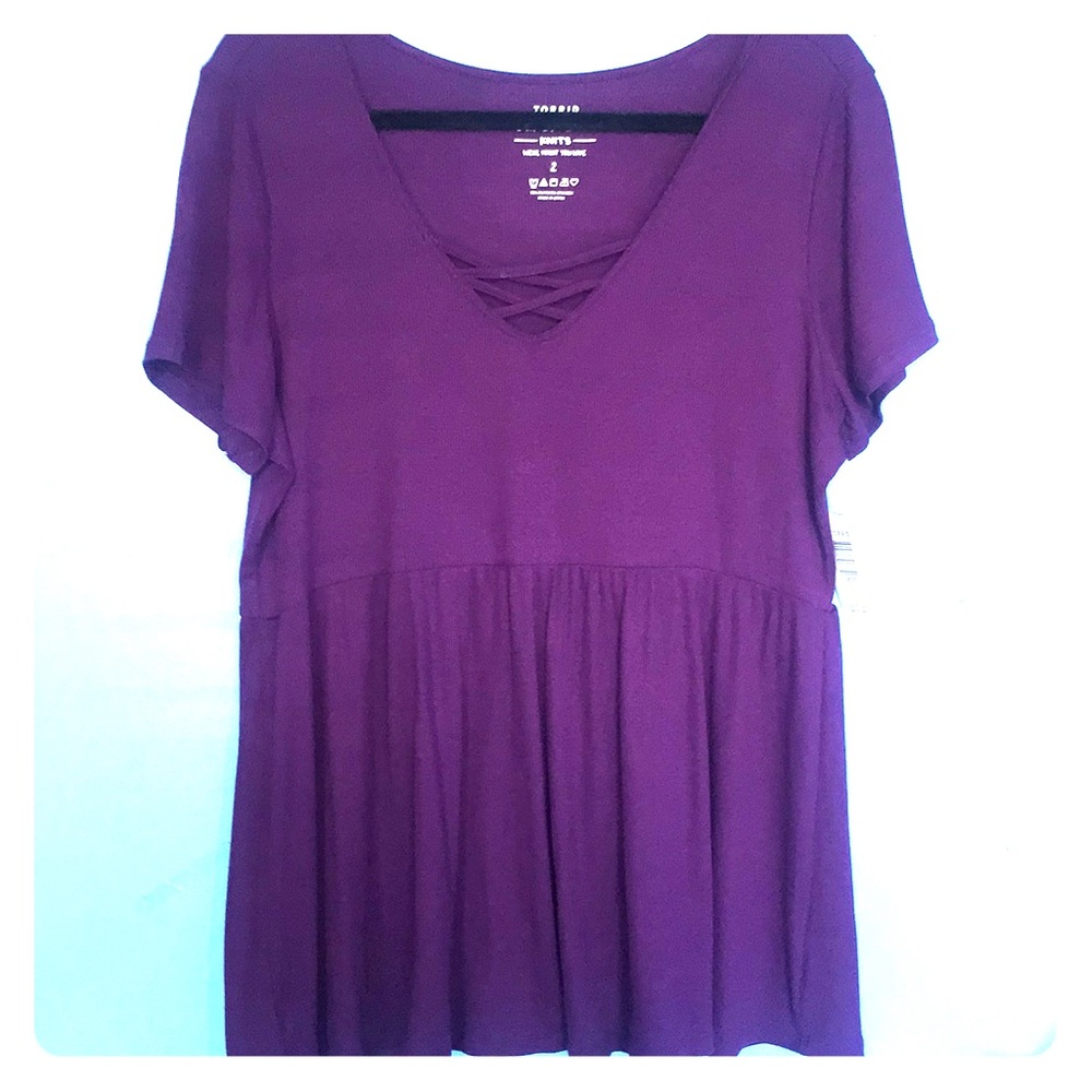 Purple shirt with cross cross chest